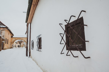 barred windows in old town Kezmarok, Slovakia