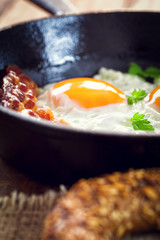 Breakfast with fried eggs and bacon 