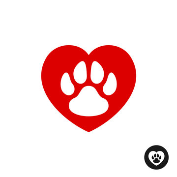 Pet paw love logo. Animal footprint with heart silhouette around.