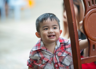 Portrait of happy joyful smiling beautiful little boy