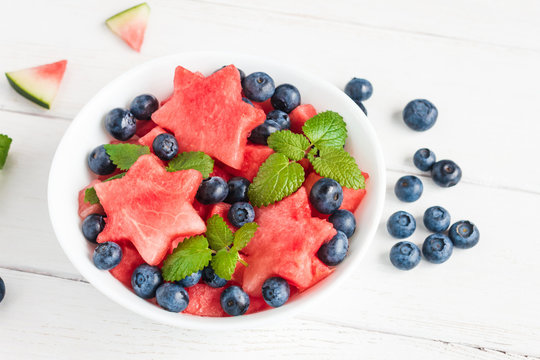 Summer fruit salad of watermelon and blueberries, top view