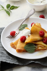 crepes with cream and berries