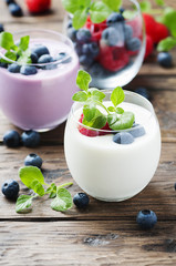 Healthy yogurt with berry and mint