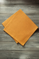 cloth napkin on wooden background