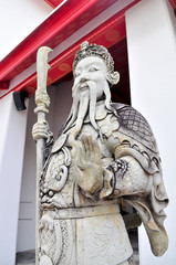Chinese statue guarding a doorway in Wat Pho Temple, Bangkok