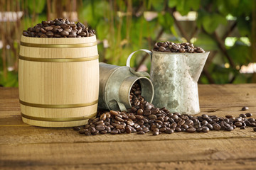 Roasted coffee beans on a wood floor