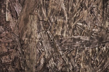 Brown dark chipboard texture to use as background 