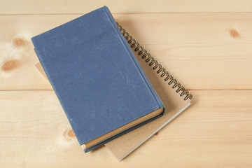 recycle notebook on wood background