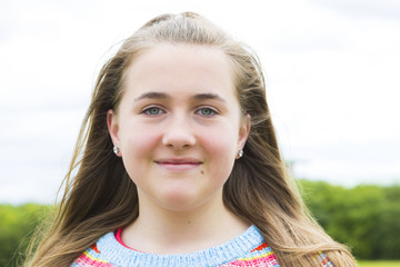 Teenage girl in summer park