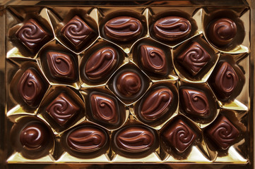 ..Chocolates in the box. Set of chocolate candies. Group of deli