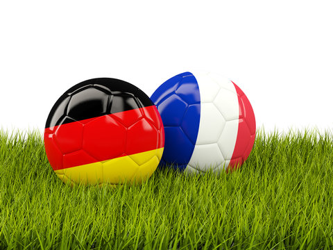 France and Germany soccer  balls on grass