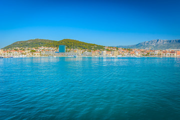 View at city of Split in summer time. / Waterfront view at coastline of city Split in summer time during touristic season, Croatia Europe.