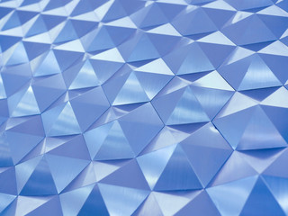 Blue low poly geometric abstract background in embossed triangular and polygon style