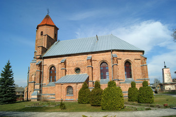 Fototapeta na wymiar St. Michael's Church - Catholic Church in the agro-town of Gniez