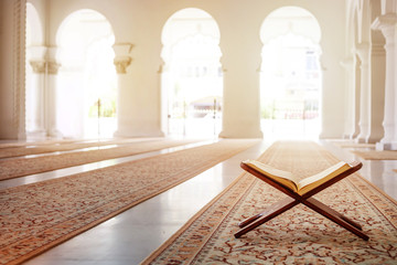 Quran - holy book of Islam in mosque - obrazy, fototapety, plakaty