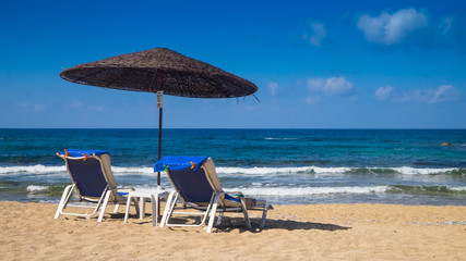 Beds and umbrella on the beach