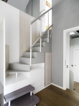wood modern staircase in the apartment