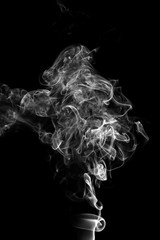 White smoke, isolated on black background.