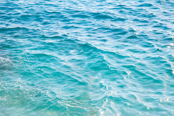 Fototapeta na wymiar texture of wavy blue sea