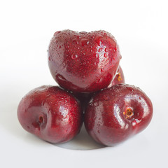 Cherry in the white cup.