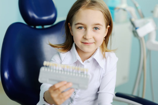 little girl in dental chair