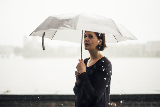 Woman with umbrella on a rainy day