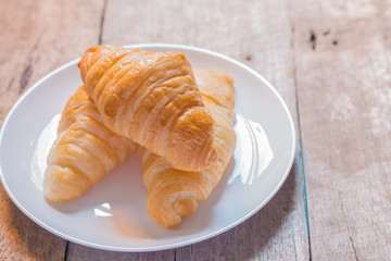Danish pastry on the wooden table