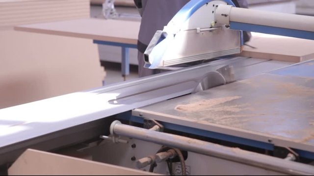 Circular Saw. Cutting Wood in Carpenter workshop. 1080p