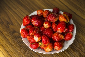 Plate with strawberries © happy_finch