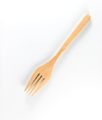 Top view of wooden fork isolated on white background