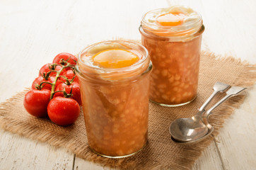 Fototapeta na wymiar baked beans with fried egg in a glass served