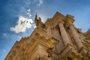 Obraz premium The statue of St. Peter and some baroque elements in the externa