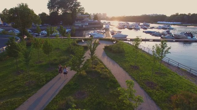 Aerial view of marina full yachts and boats at sunset