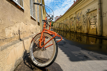 City bike for rent, parked in old town street