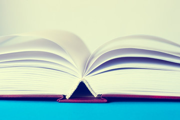 Open book on light table. Back to school. Copy space