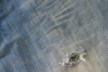 Stitched textured blue denim jeans background