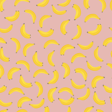 Banana seamless pattern. Yellow bananas on pink background.