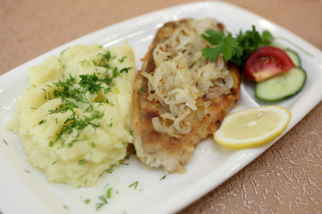 Plate with baked fillet of pikeperch