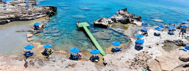 Oasis beach. Panoramic view of one of the smaller beaches of Kalithea in Rhodes, Greece