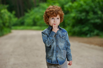 Fototapeta premium cute little emotional boy