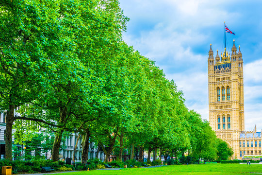 Palace of Westminster and Buxton Memorial Fountain in Victoria Tower Gardens in London