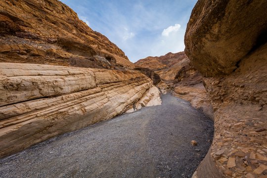 The canyon narrows dramatically to a deep slot cut. Mosaic Canyon, Death Valley National Park, Stovepipe Wells Area