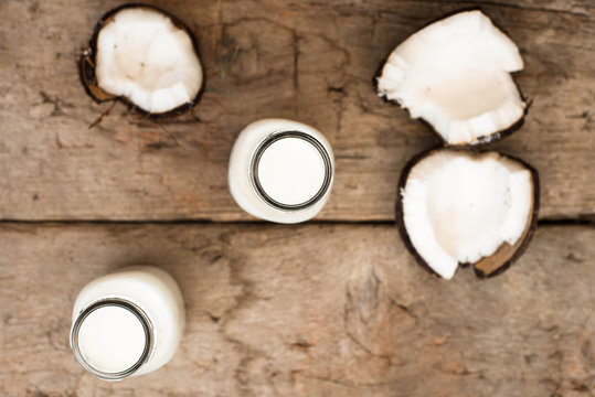 Coconut milk on wooden table Eye bird view