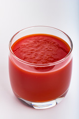 Tomato juice in a glass.