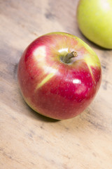 tasty apples on a wooden background