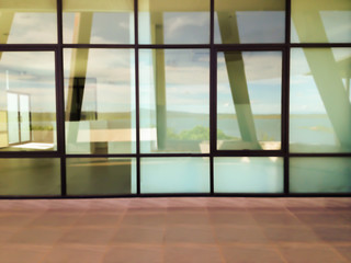 Blurred background modern office window glass plate or glass wall partition