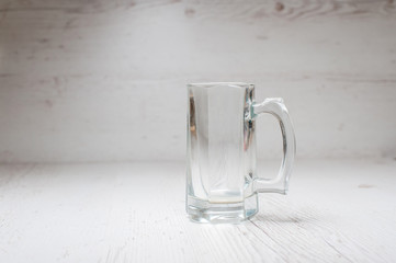 Empty Beer Mug on a light background