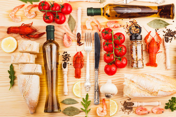 Silverware with spices, cherry tomatoes and cancers