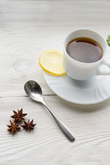 Obraz na płótnie Canvas Herbal tea with mint on old wooden table.