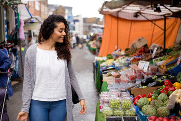 young woman shopping at the market